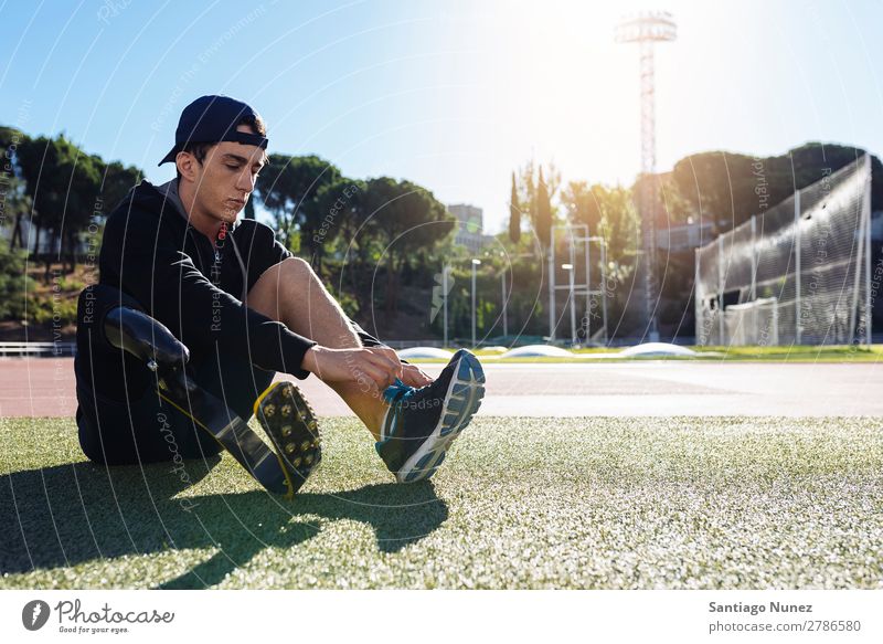 Disabled man athlete ready for training with leg prosthesis. Man Runner Running Portrait photograph Athlete Sports prosthetic Handicapped disabled paralympic