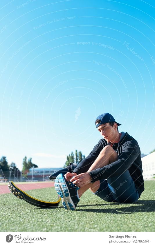 Disabled man athlete ready for training with leg prosthesis. Man Runner Running Portrait photograph Athlete Sports prosthetic Handicapped disabled paralympic