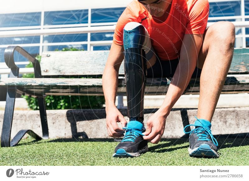 Disabled man athlete ready for training with leg prosthesis. Man Runner Running Portrait photograph Athlete Sports prosthetic Handicapped disabled paralympic