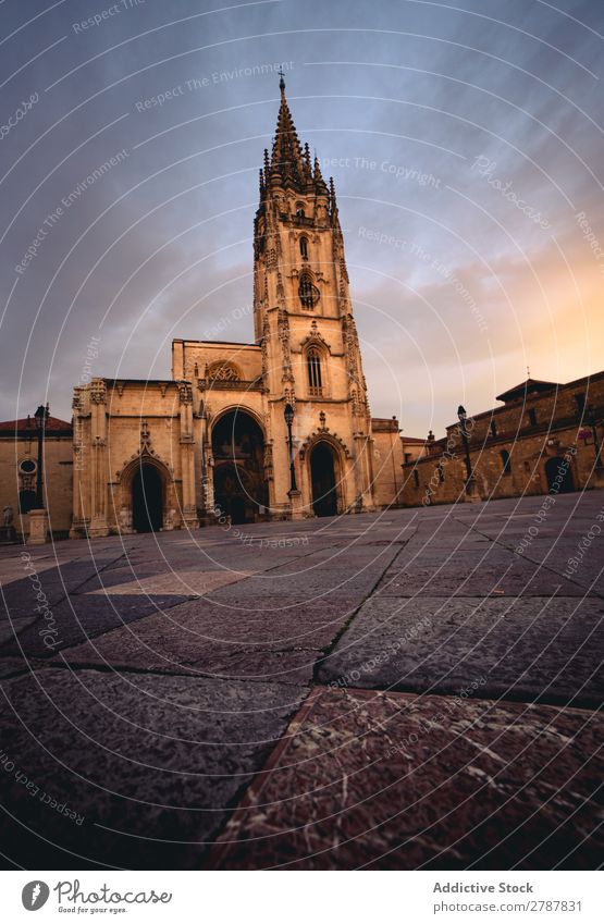 Old cathedral near hills and blue sky Cathedral Sky Monastery Plant Court building Clouds Heaven Ancient Blue Religion and faith Building Stone Height yard