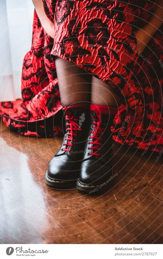 Woman in dress lacing boots Boots Dress Room curtains Story Wood Red Lady Fashion Model Style Black Leather vogue glamour Easygoing Vintage Elegant Footwear Sit