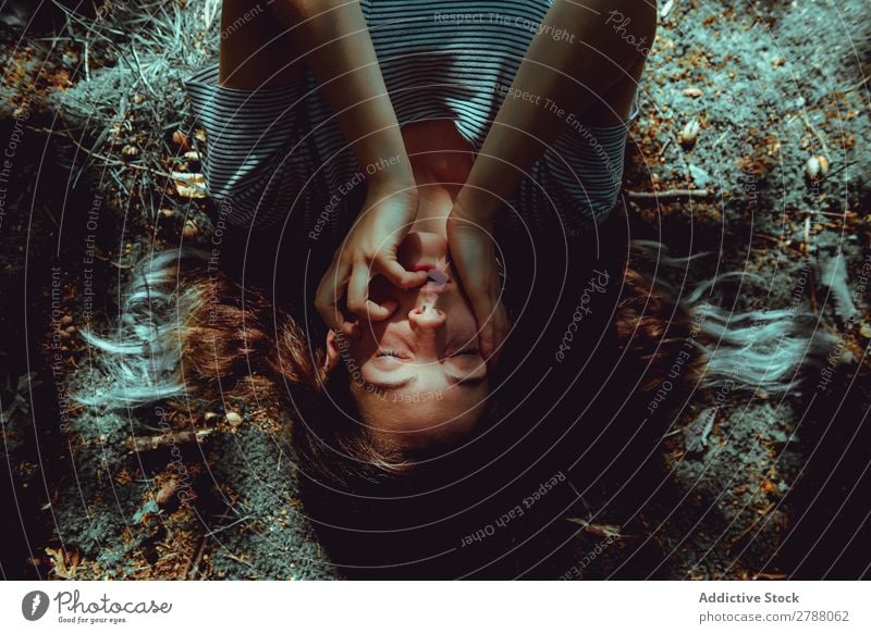 Woman lying on ground Ground Mouth Lie (Untruth) Earth Summer Lady Youth (Young adults) Relaxation Haze Conceptual design Nature Expression Resting Loneliness