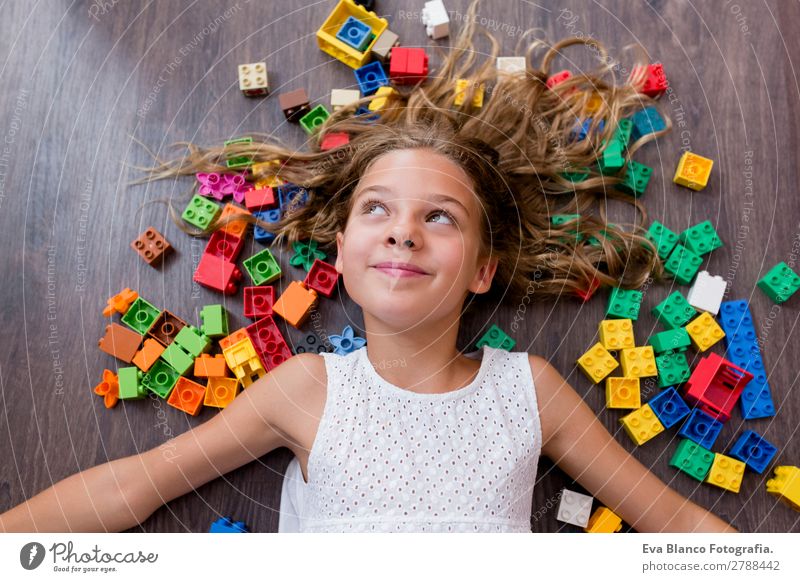 portrait of a Cute preteen girl playing at home Joy Happy Leisure and hobbies Playing Kindergarten Child School Feminine Girl Infancy Fingers 1 Human being