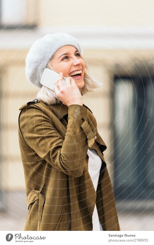 Portrait of a Young woman using her mobile phone. Woman Portrait photograph Youth (Young adults) Blonde Happy Girl Beautiful Mobile Telephone Cellphone