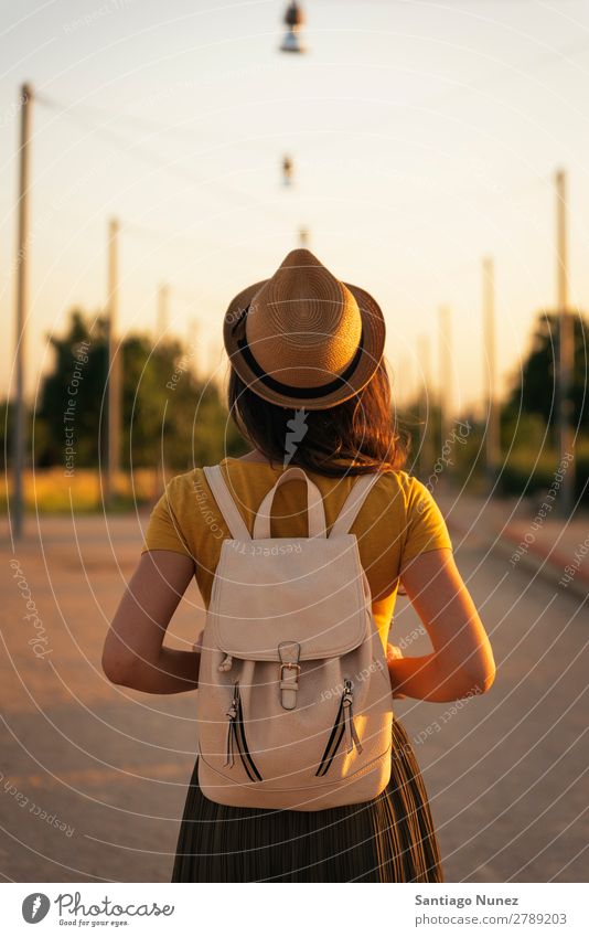 Back view of young woman looking the road. Woman Hope Dress Spring Youth (Young adults) Autumn Sunset Vantage point Beautiful Sunlight Summer Love Looking Dream