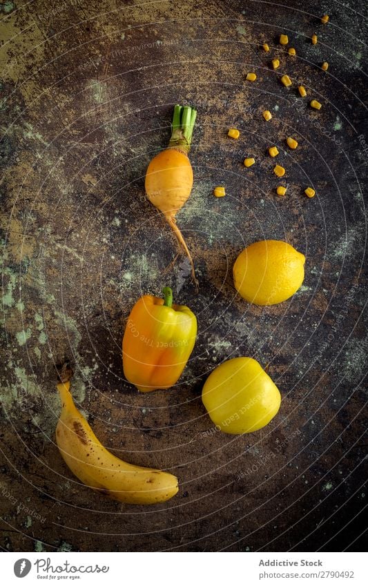 Mix of fruits and vegetables in yellow color Vegetable Food Detox Lemon Banana Apple corn turnip Pepper assortment Background picture Diet Fresh Yellow Healthy