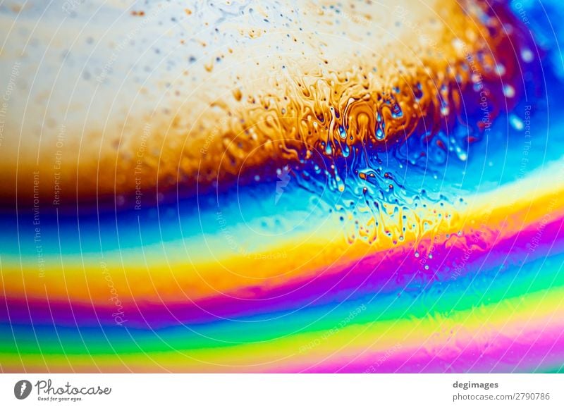 Colour spectrum abstract background. Rainbow colours. Art Bright Crazy Blue Consistency oil Soap bubble psychedelic iridescent light liquid water colorful