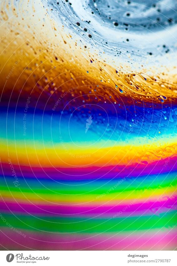 Colour spectrum abstract background. Rainbow colours. Art Bright Crazy Blue Consistency oil Soap bubble psychedelic iridescent light liquid water colorful