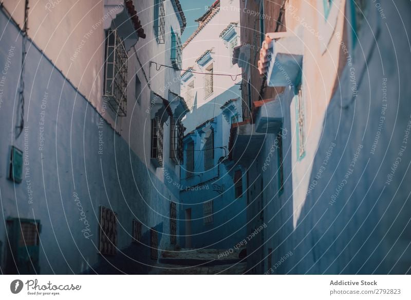 Street with old buildings Building Narrow Chechaouen Morocco Construction Facade Old Blue Vacation & Travel Sunbeam Day Tourism Beautiful romantic Limestone