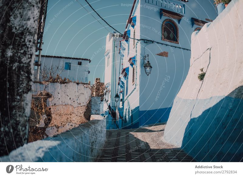 Street with old buildings Building Chechaouen Morocco Construction Facade Old Blue Vacation & Travel Sunbeam Day Tourism Beautiful romantic Limestone Stone