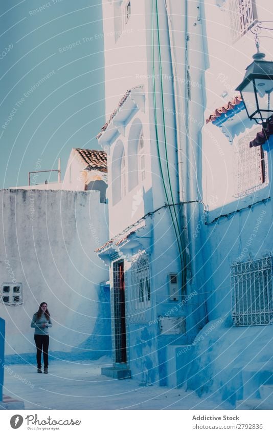 Tourist woman walking on white street Woman Walking Street Morocco Chechaouen Tradition Vacation & Travel Culture City arabic Town Multicoloured Tourism