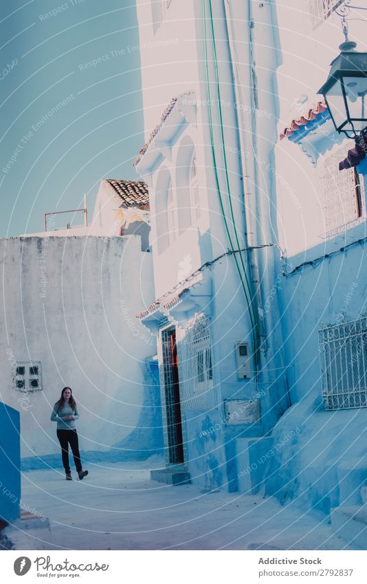 Tourist woman walking on white street Woman Walking Street Morocco Chechaouen Tradition Vacation & Travel Culture City arabic Town Multicoloured Tourism