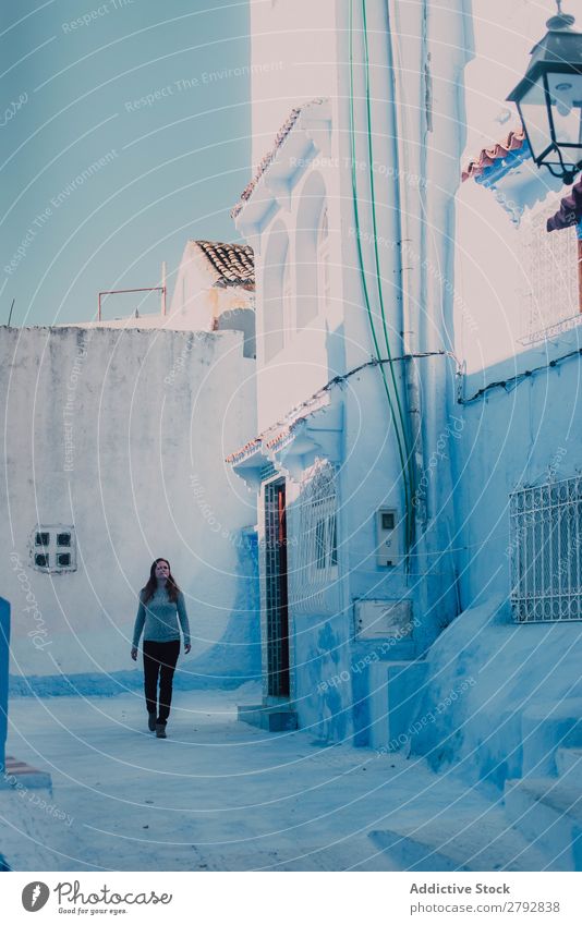 Tourist woman walking on white street Woman Street Morocco Chechaouen Tradition Vacation & Travel Culture City arabic Town Multicoloured Tourism Famous building