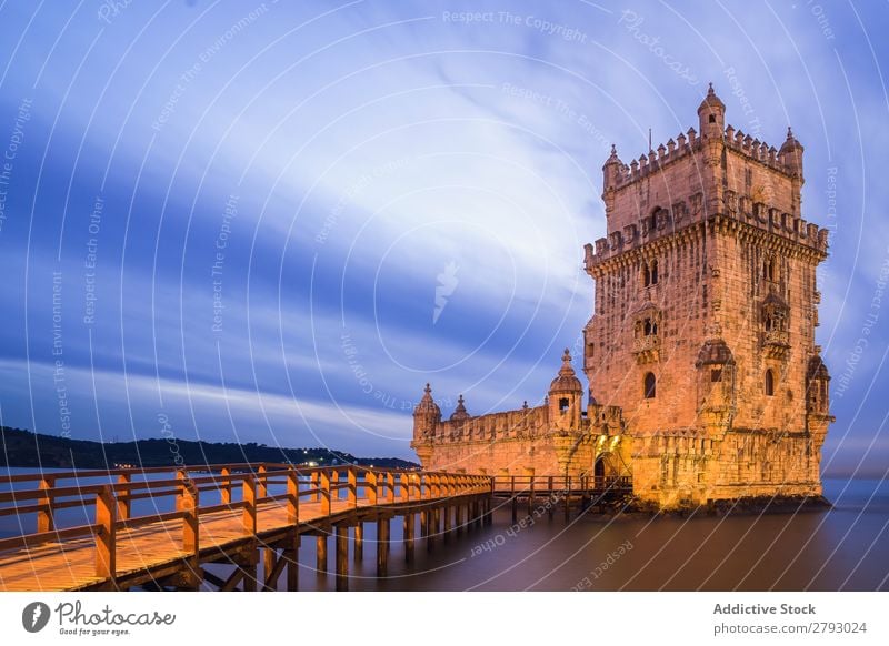 Medieval stone tower in dusky seascape Tower medieval Ocean Fortress Nature Sunset Architecture Landscape River Long exposure Old Monument Vacation & Travel Sky