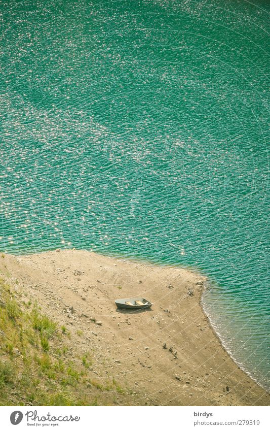 aground Beautiful weather Waves Lakeside Beach Lago di Valvestina Rowboat Authentic Small Wet Original Warmth Yellow Turquoise Calm Loneliness Climate Crisis