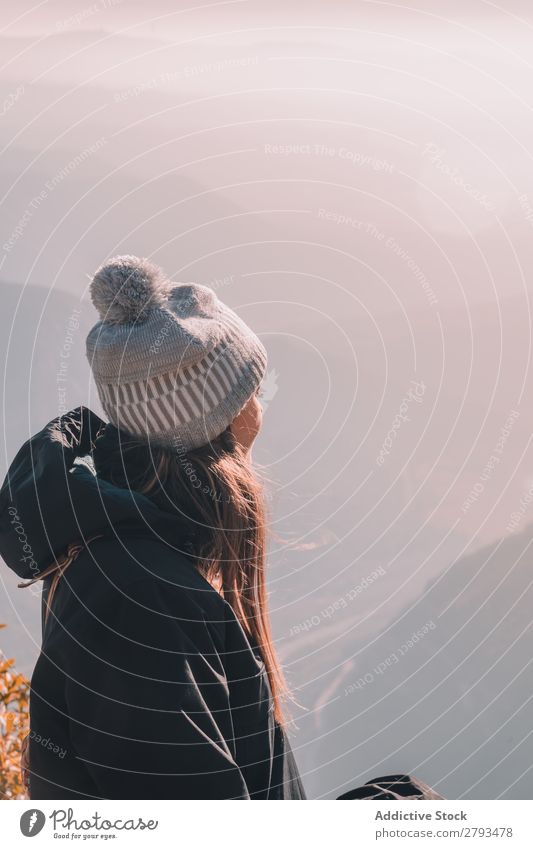 Woman in coat on hill Hill Valley Coat Hat Top Mountain Sky Clouds Peak Lady Hiking Tourist Vacation & Travel Freedom Adventure Landscape Youth (Young adults)