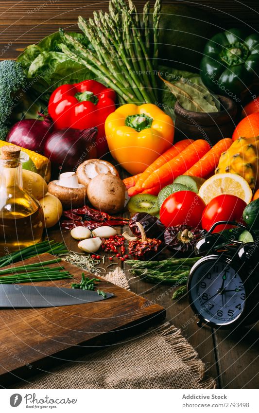 Cooking ingredients and utensils on table Ingredients Vegetable Oil Table Food Kitchen assorted Fresh Organic Natural Vegan diet Pepper Broccoli Carrot