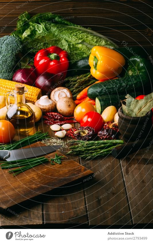 Cooking ingredients and utensils on table Ingredients Vegetable Oil Table Food Kitchen assorted Fresh Organic Natural Vegan diet Pepper Broccoli Carrot