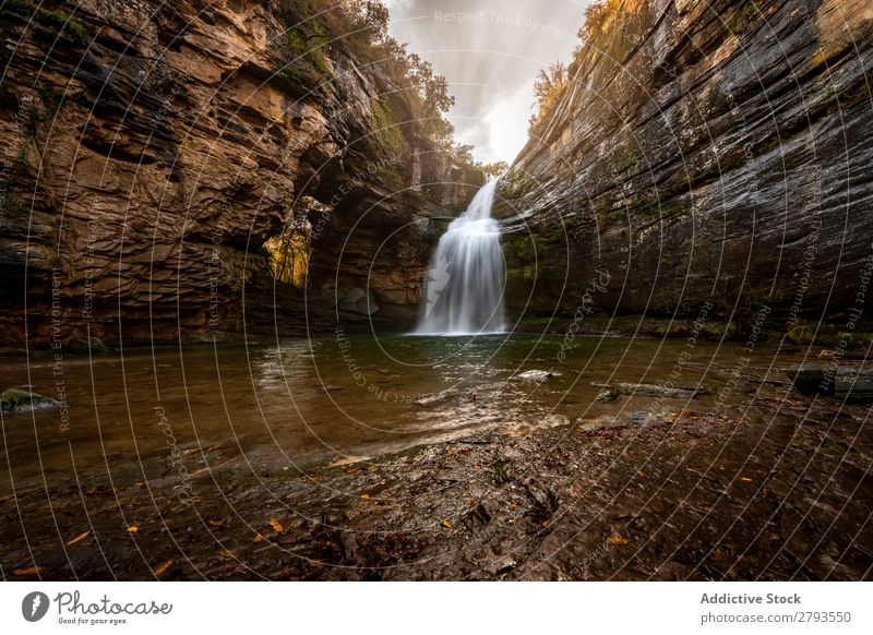 Fantastic waterfall on cloudy day in countryside Waterfall Lake Cliff Clouds Day Stream cantonigros Barcelona Spain Nature Landscape Rock cascade Tourism