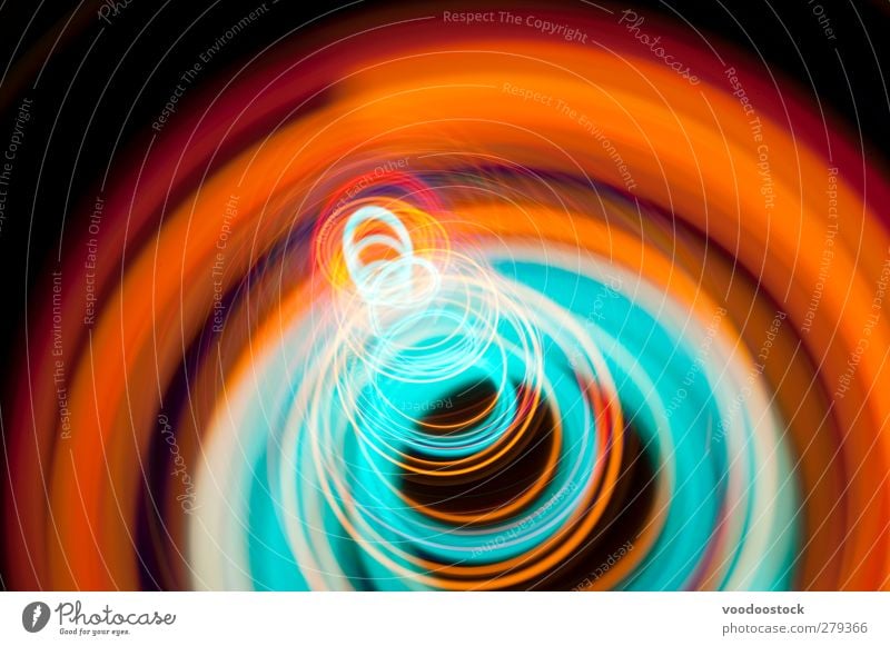 Abstract Coil of Spiral of Light Line Bright Colour circles trace colorful glowing eye catching Orange Cyan Glow Multicoloured Depth of field Studio shot