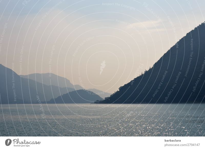 Water, mountains, blue sky at Lake Iseo. Vacation & Travel Far-off places Landscape Elements Earth Sky Alps Mountain Italy Village Fishing village To enjoy Blue