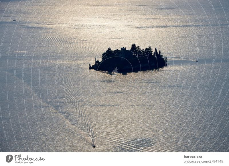 Isola di Loreto, Lake Iseo. Vacation & Travel Human being Water Island Italy Castle Manmade structures Navigation Boating trip Sailboat Illuminate Bright Blue