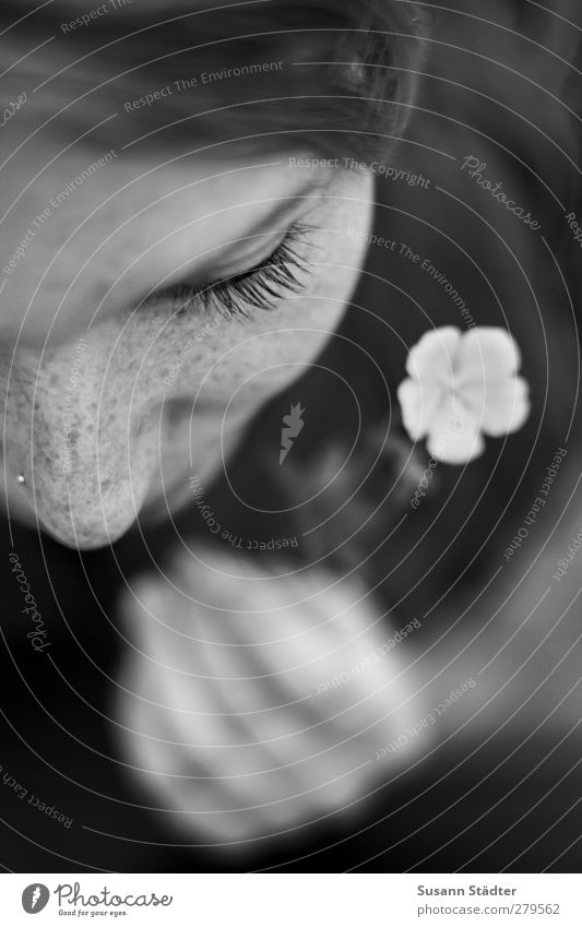 * Feminine Woman Adults Head 1 Human being Flower Long-haired Gift Freckles Nasal piercing Eyelash Blur Delicate To enjoy Black & white photo Exterior shot