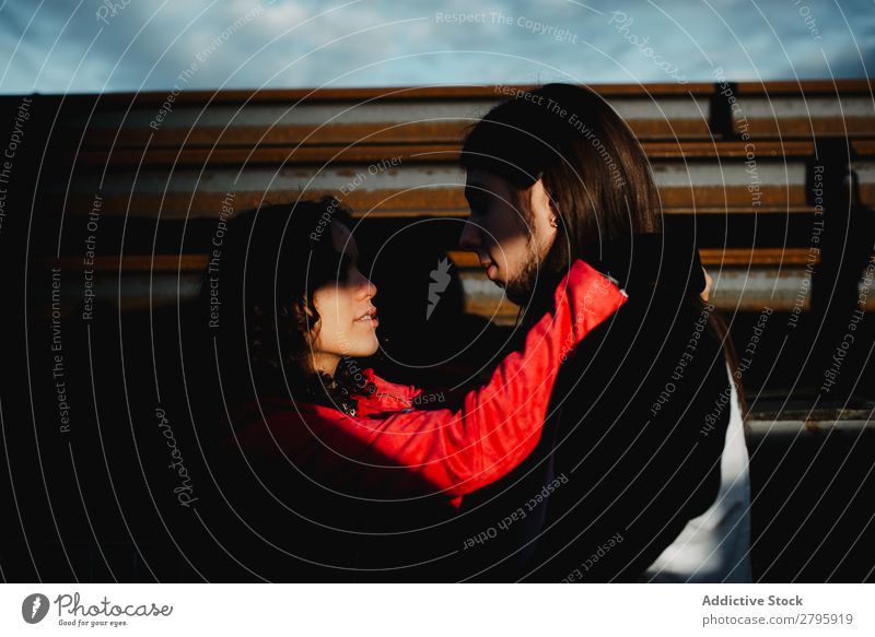 Long haired man hugging and kissing woman near train Couple abandoned wagons Embrace Railroad Graffiti old train Kissing Love Engines Hipster