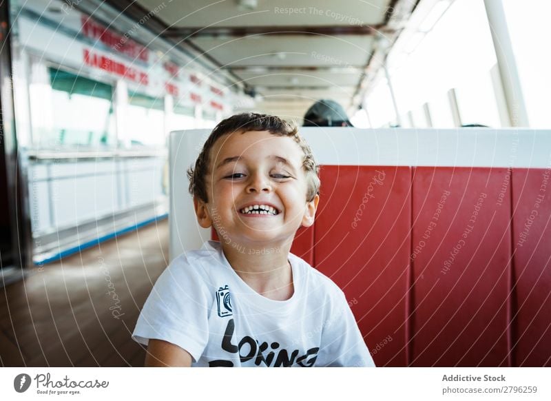 Boy smiling on seat Boy (child) Face Child Funny Seat Sit Table Man Joy Infancy Expression Happiness Lifestyle Gesture brunet Crazy Uniqueness Sadness Fatigue