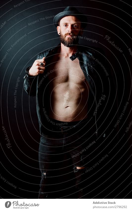 Young shirtless bearded guy in leather jacket Man Leather jacket Hipster Youth (Young adults) Adjust Hat Guy handsome Cool (slang) Style Easygoing Studio shot