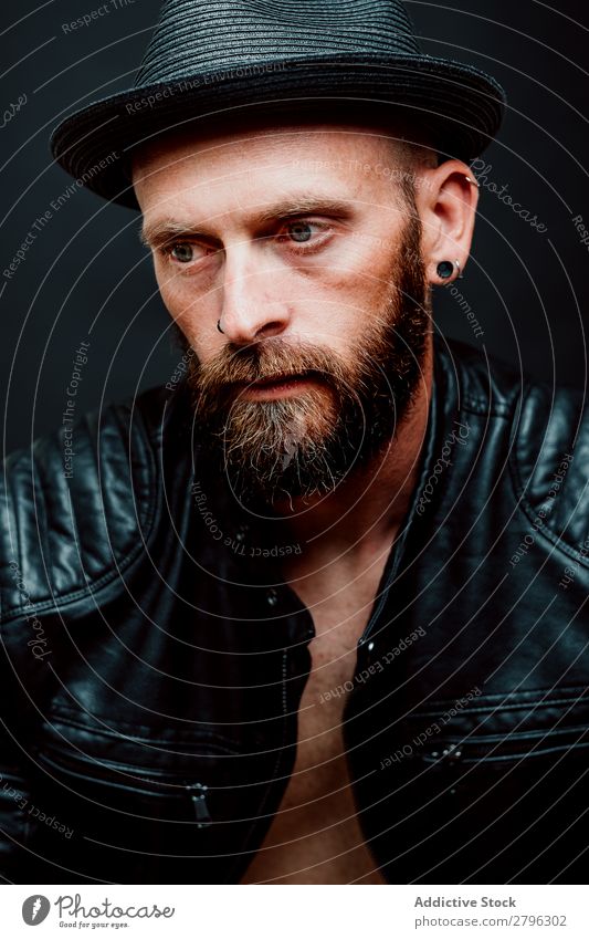 Young bearded guy in leather jacket Man Leather jacket Hipster Youth (Young adults) Hat Guy handsome Cool (slang) Style Easygoing Studio shot Interest Macho