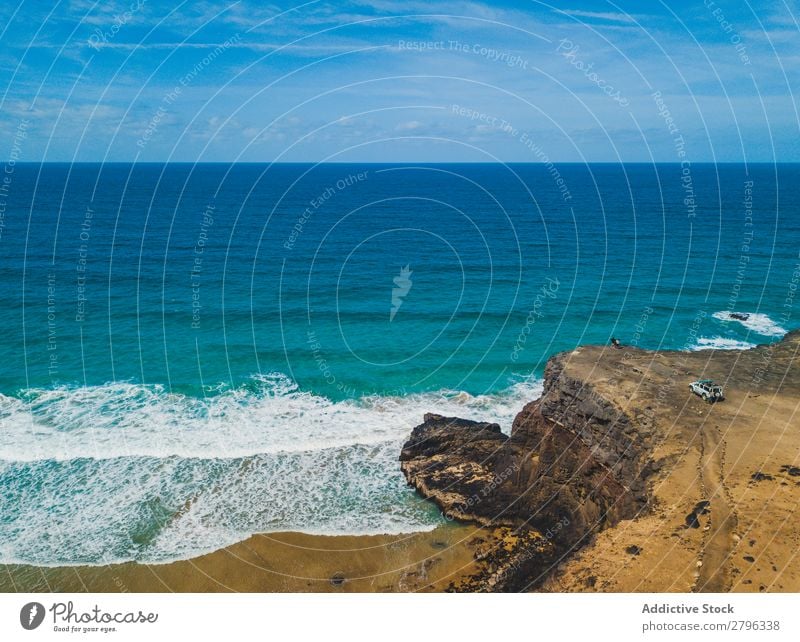 Amazing shoreline of ocean from drone Coast drone view Ocean Cliff Landscape Majestic Spain las palmas Fuerteventura Aircraft Nature Water Waves Power Turquoise