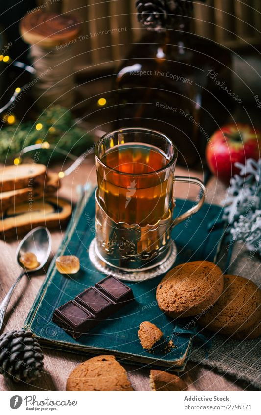 Chocolate and cookies near tea Cookie Tea Book Old Christmas & Advent Cone Food Sweet Dessert biscuit Snack Retro Delicious Tasty yummy Mug Cup Fresh Gourmet