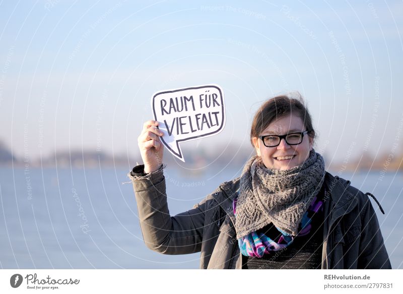 Woman holding a speech bubble - room for diversity Adults Speech bubble Characters Signs and labeling Signage To hold on Society Sociology portrait Optimism