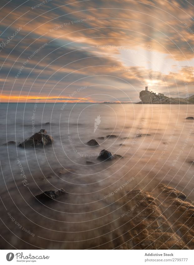 Sundown sky over sea and stony coast Sky Sunset Ocean Coast Stone Evening Nature cala charco alicante Spain Clouds Weather Cloud cover Dusk Twilight Bright Rock