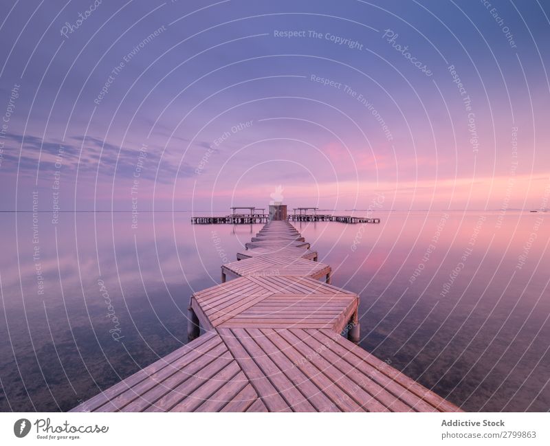 Wooden pier on cloudy evening Jetty Ocean Water Clouds Sky Calm mar menor murcia Spain Vacation & Travel Trip Evening Nature Harmonious Idyll Weather Tourism