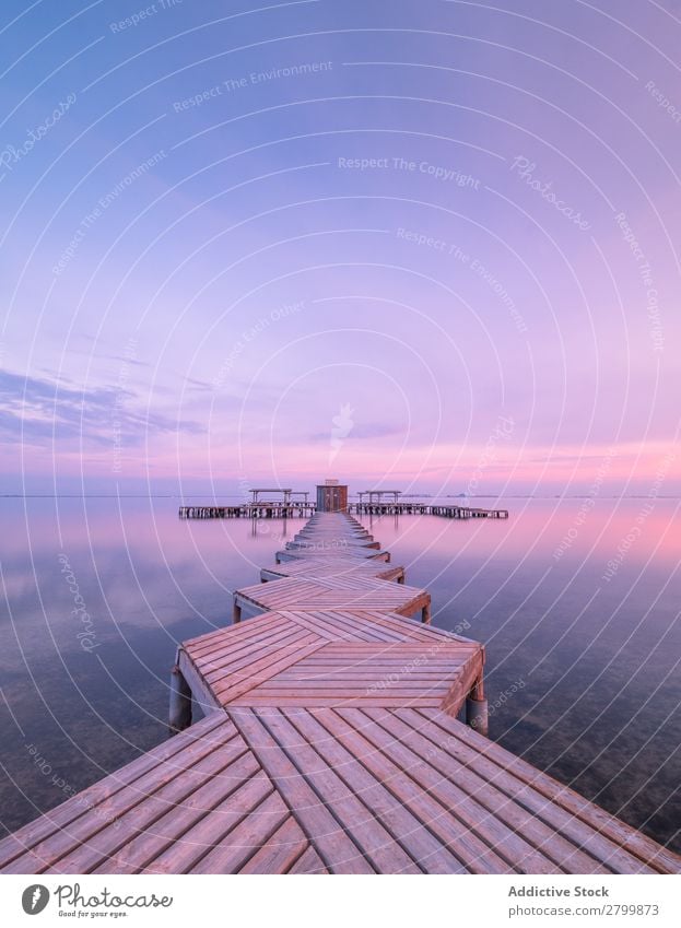 Wooden pier on cloudy evening Jetty Ocean Water Clouds Sky Calm mar menor murcia Spain Vacation & Travel Trip Evening Nature Harmonious Idyll Weather Tourism