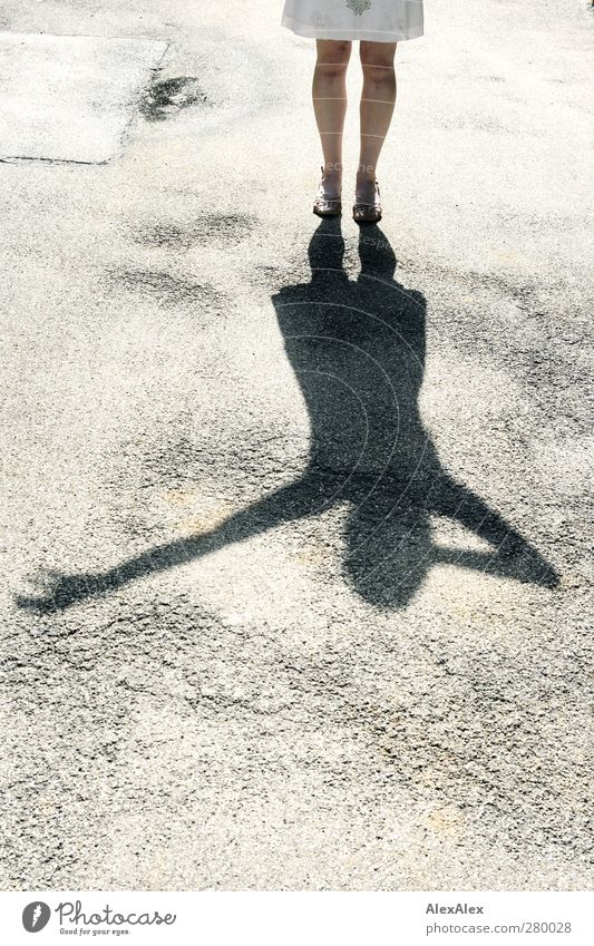 shadow plays Woman Adults Legs Feet 1 Human being 30 - 45 years Asphalt Glittering Playing Sports Stand Illuminate Free Positive Rebellious Thin Under Feminine