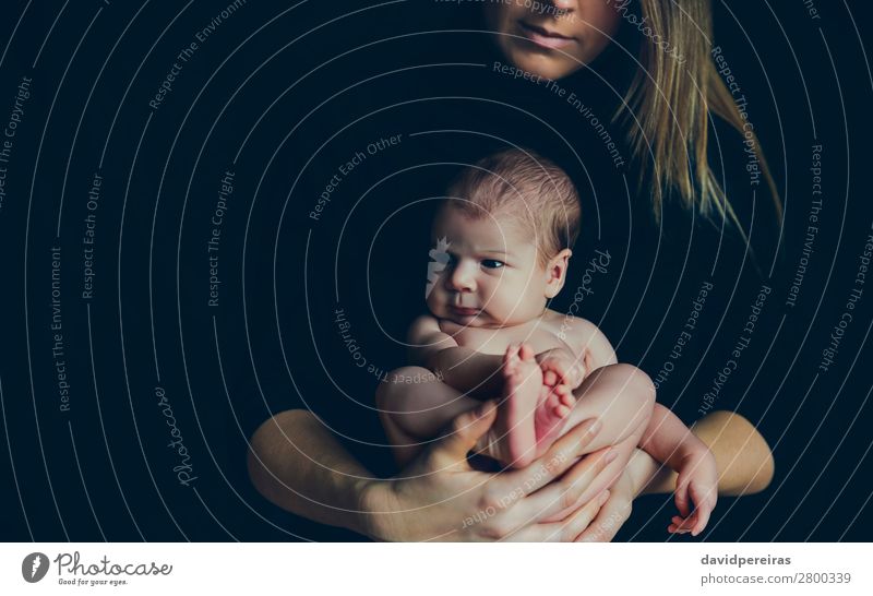 Nude baby posing in her mother's arms Lifestyle Beautiful Living room Child Human being Baby Woman Adults Mother Family & Relations Blonde Love Carrying Embrace