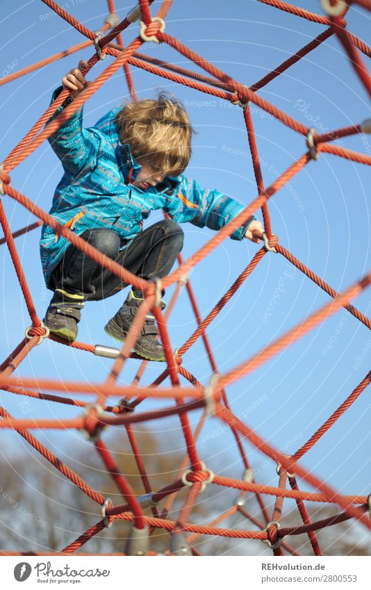 Child climbs on the playground Human being Boy (child) Infancy 1 3 - 8 years Sky Cloudless sky spring Beautiful weather Playground Movement Playing Authentic