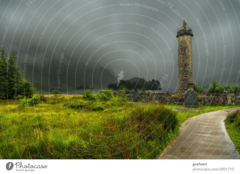 Glenfinnan Monument At Loch Shiel In Scotland bonnie prince charly charles clans clouds cloudy column destination environment fog foggy forest glen glenfinnan