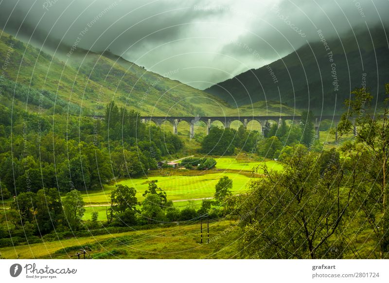 Glenfinnan Railway Viaduct At Loch Shiel In Scotland arch architecture bridge building clouds cloudy construction destination distance engineering environment