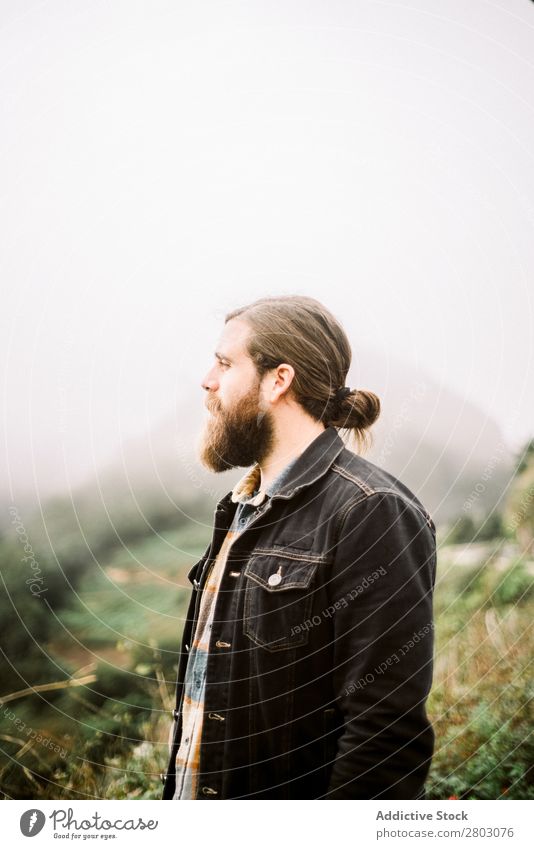 Bearded man in foggy countryside Man Landscape Fog Looking away Vacation & Travel playa norte Spain Nature bearded admiring Style Hip & trendy Easygoing Trip