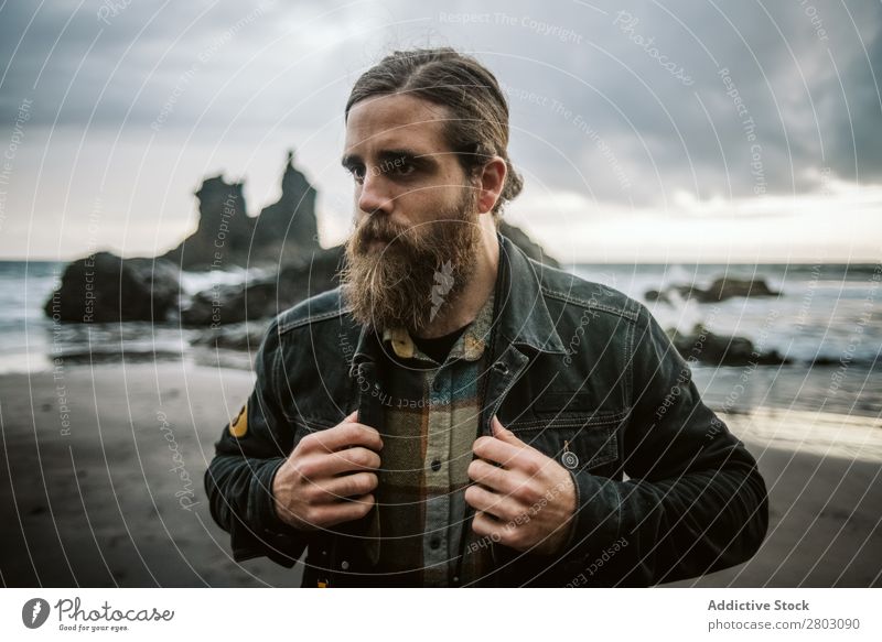 Bearded man standing near sea Man Ocean Vacation & Travel Coast Nature Looking away bearded Waves Storm Landscape Spain playa norte Professional Lifestyle