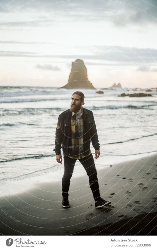 Bearded traveler looking away near sea Man Ocean Coast Looking away Dream Nature Amazed Vacation & Travel bearded Style Easygoing Hip & trendy surprised