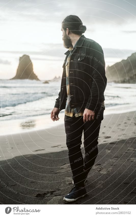 Bearded traveler looking away near sea Man Ocean Coast Looking away Dream Nature Amazed Vacation & Travel bearded Style Easygoing Hip & trendy playa norte Spain