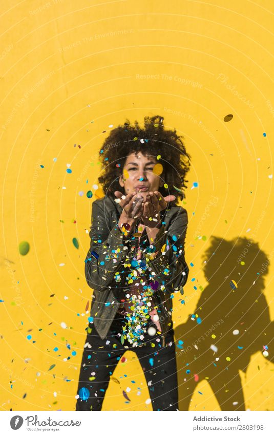 Black woman with afro hair celebrating with confetti. African Afro Background picture Beautiful Beauty Photography Birthday Blue Guest Feasts & Celebrations