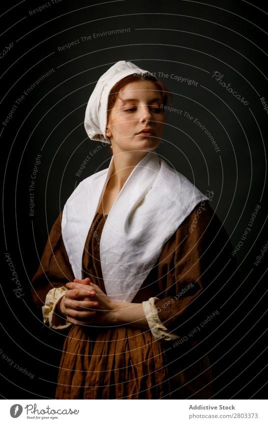 Medieval maid posing in studio medieval Woman Clothing historical Dress Costume maiden Car Hood Renaissance Vintage Retro peasant To enjoy Baroque Fantasy Hat