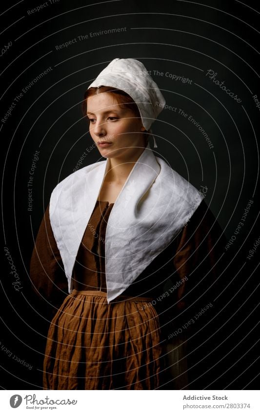 Medieval maid posing in studio medieval Woman Clothing historical Dress Costume maiden Car Hood Renaissance Vintage Retro peasant To enjoy Baroque Fantasy Hat