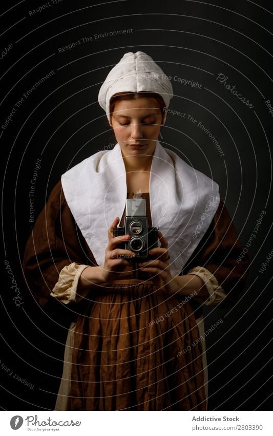 Medieval woman with photo camera Woman Red-haired Baroque Conceptual design Dress medieval Carnival Renaissance Princess Royal masquerade Fantasy aristocrat